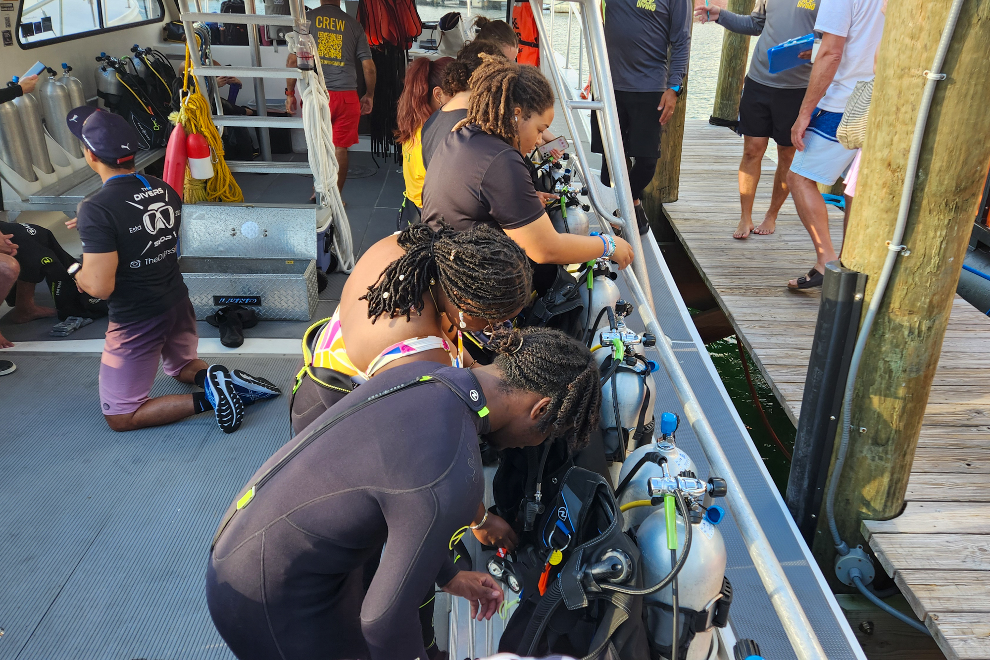 Your Shores students check their dive gear. Credit: Phillip and Patricia Frost Museum of Science