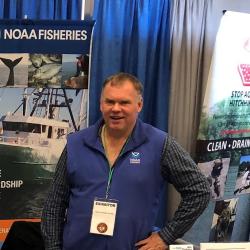 Port Agent Bill Duffy at outreach booth. 