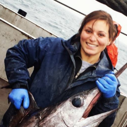 Kristina holding swordfish.