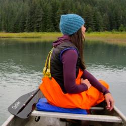 Jodie Pirtle sitting in a canoe looking away from the camera