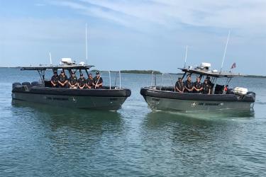 NOAA Enforcement patrol boats on the water.