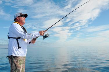 An angler wade fishes.