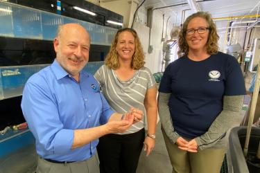 A photo of Jennifer Doerr and Jennifer Leo in the Galveston Laboratory alongside Dr. Spinrad