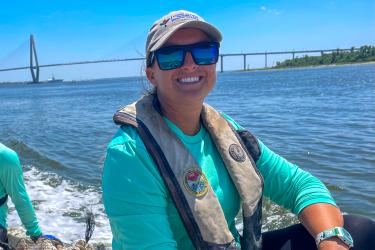 Lindsay helping to transport oyster bags for a restoration project in Charleston Harbor. Credit: NOAA Fisheries/Lindsay French