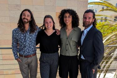 Group of interns smiling for the camera
