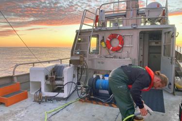 View aboard a research vessel at sunset