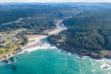 The Big River flows into the Pacific Ocean on the Mendocino Coast. NOAA has funded numerous restoration projects on the Big River to benefit Central California Coast coho salmon. Credit: Adobe Stock