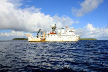 NOAA Ship Hi‘ialakai in front of Swains Island.