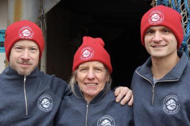 NOAA scientists aboard an international cruise to track salmon in Alaska.  Credit: NOAA Fisheries