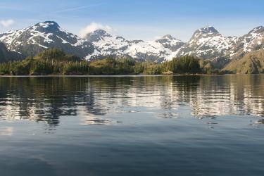 Water with mountains in the background
