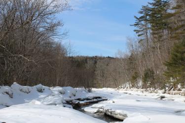 Snow covered river in Maine