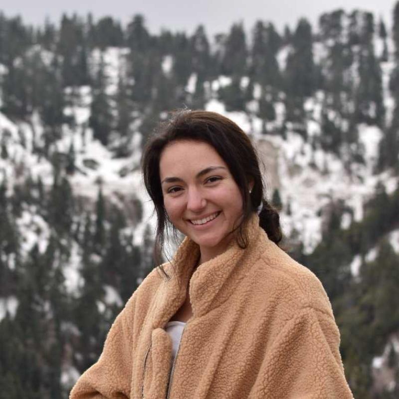 Photograph of Audrey Kuptz taken in the mountains.