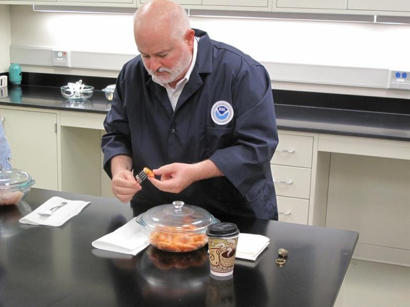 Steve Wilson, Director of NOAA Fisheries' Seafood Inspection Program, analyzes a shrimp sample at NOAA's National Seafood Inspection Lab in Pascagoula, Mississippi.