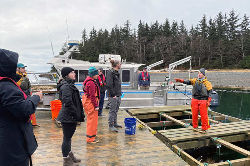 NOAA Aquaculture staff talking with Alaskan oyster farmers