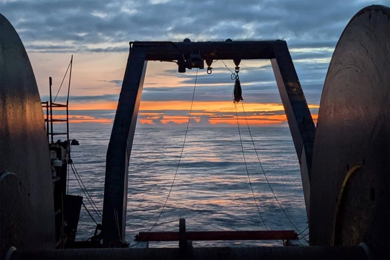 Sun setting over the ocean as seen aboard a research vessel