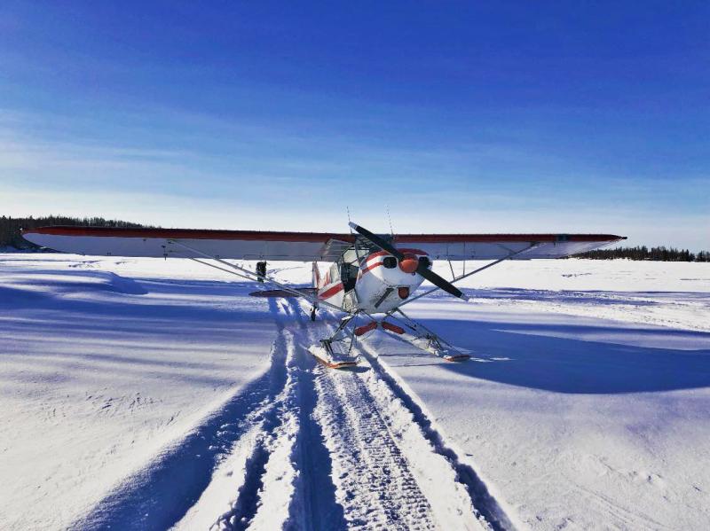 Plane on snowy landscape