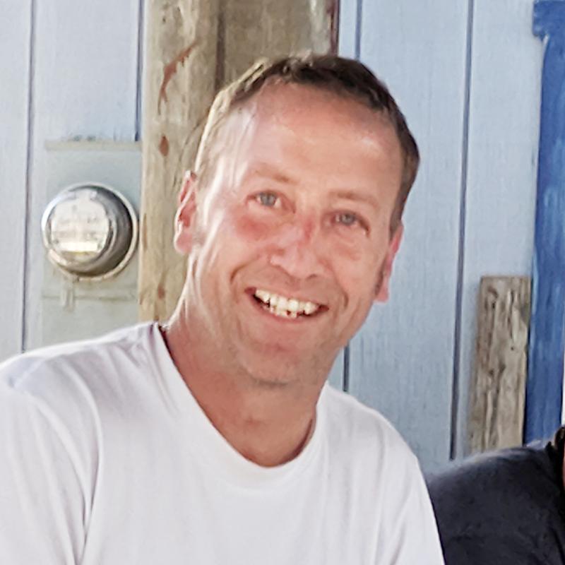 Portrait of scientist in a white shirt