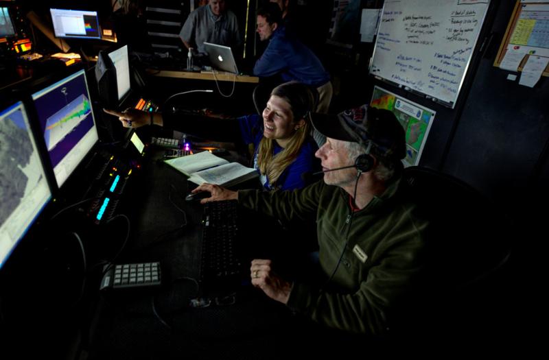 Dave Paker and Meredity in control room during expedition.