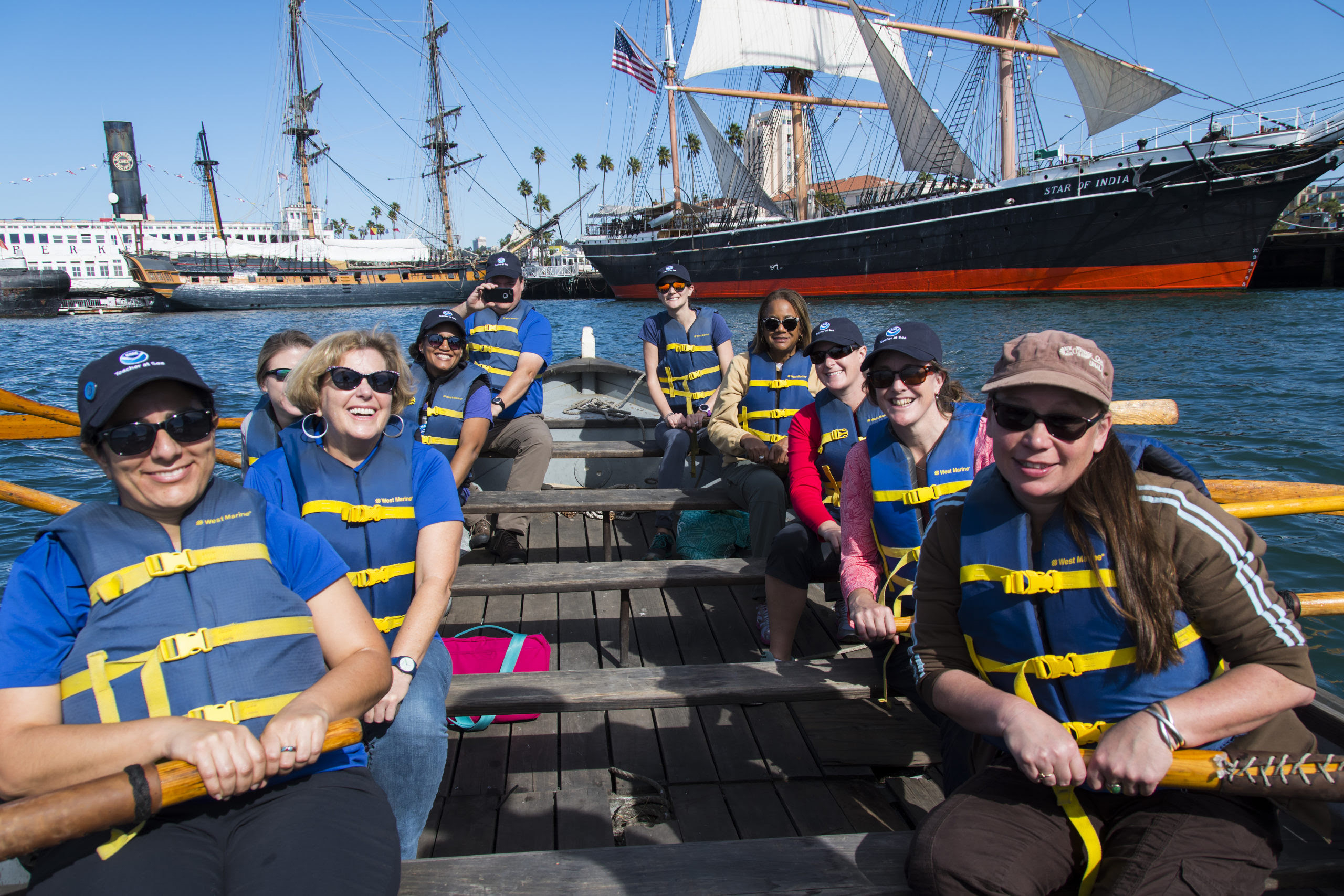 Teacher at Sea alumni try their hand at rowing a historic longboat at the Maritime Museum of San Diego during the Southwest Teacher at Sea Alumni Workshop in 2017
