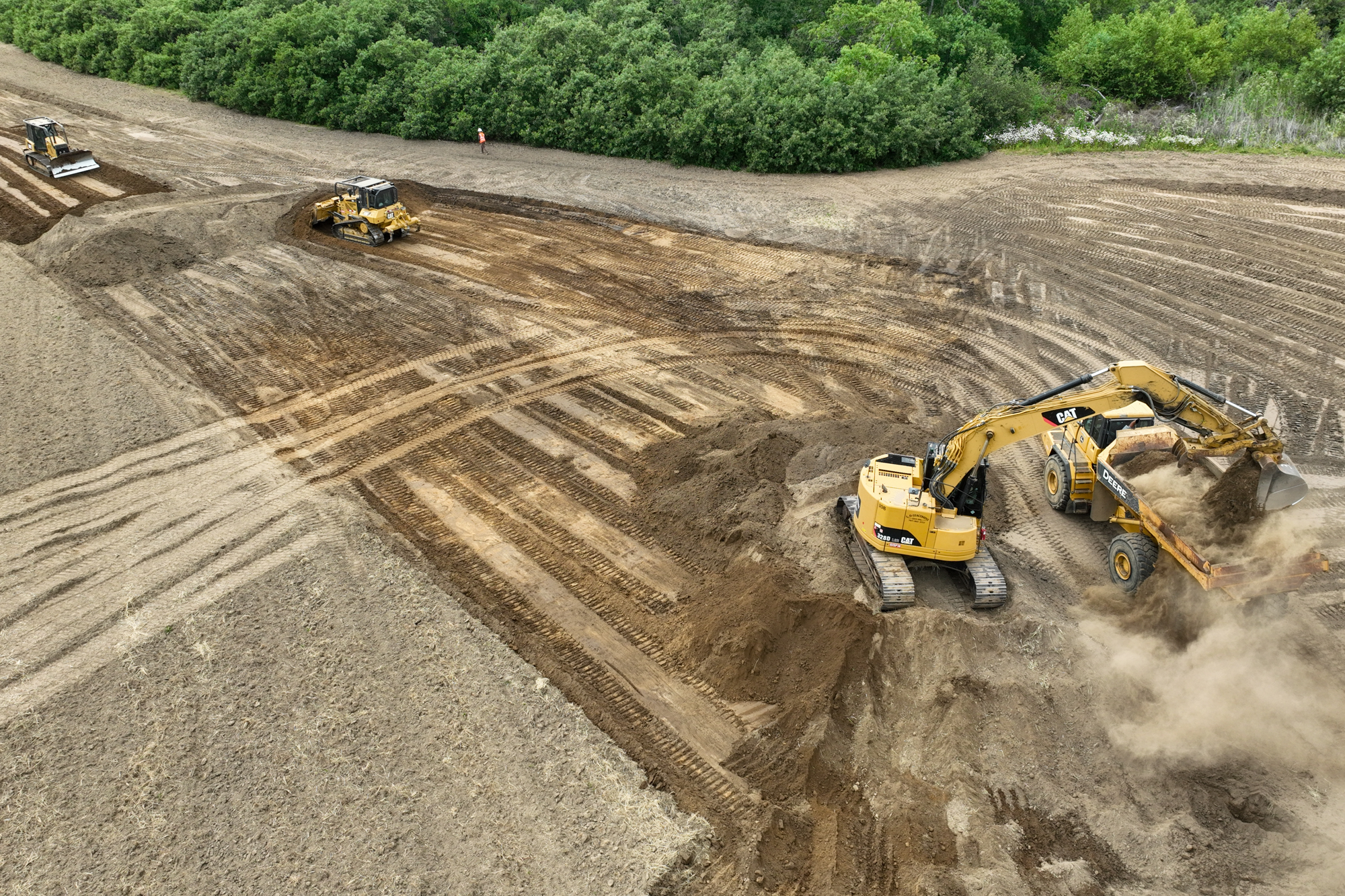 Excavators creating floodplains at the Butano Creek project site