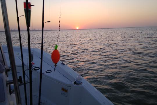 Fishing at sunset.