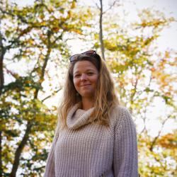 Picture of Kaitlyn Shaw outside with trees in background