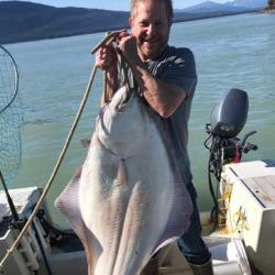 Alexander Kotalrov holding fish