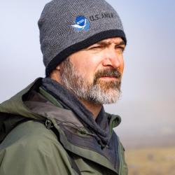 photo of biologist Doug Krause in the field 