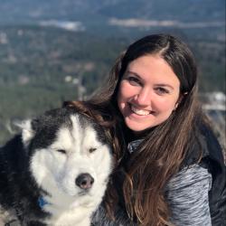 Photo of Burlyn Birkemeier with a Siberian Husky.