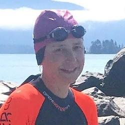 Jenny McBride wearing goggles and swim cap