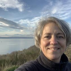 picture of woman next to water