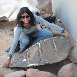 Manula Tiwari with sea turtle carapace.