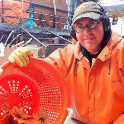 photo of Sean Rooney, Alaska Fisheries Science Center scientist on a survey