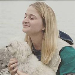 Woman smiling with dog