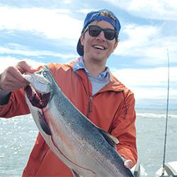 Man smiling with fish