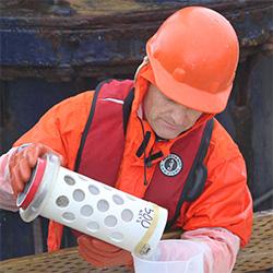 Scientist handling samples
