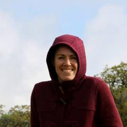 Dana Morton in a red hoodie.