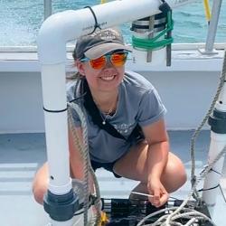 Mary Kate Munley checking gear. 