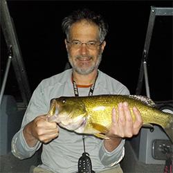 Scientist holding a fish