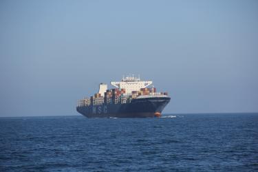 Photograph of cargo ship in the Pacific Ocean taken by Anne Simonis. 