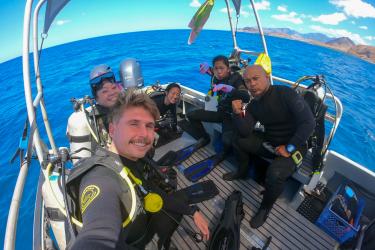 COAST participants prepare for one of their first restoration dives. From left to right: Baylee Jackson, Pono Okimoto, Denise Oishi (instructor) Ciara Ratum, and Makaio Villanueva.