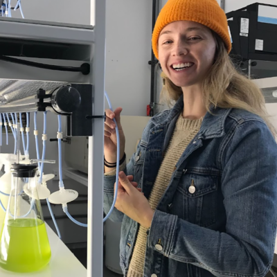 Technician Becca Cates demonstrates the new algae culture capacity at TSMRI.