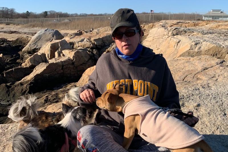 Kate Zewinski enjoys her favorite nature spot with her three dogs.