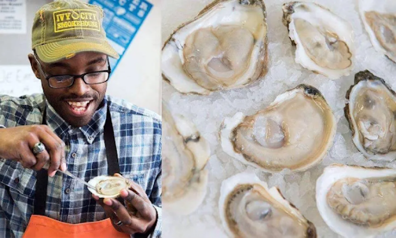 The Oyster Ninja, Gardner Douglas, carefully trims a raw oyster from its shell. Photo credit: Gardner Douglas.