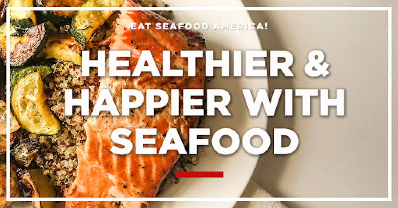 A plate of cooked salmon with quinoa and squash, along with the text "Eat Seafood America! Healthier & Happier with Seafood."