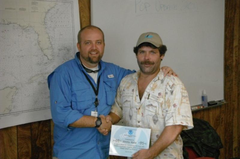 Ken Keene and Jimmy Rollo celebrating Rollo’s 100th trip as an observer.