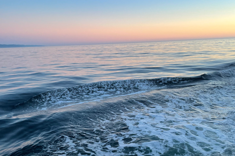 Sunset over ocean water