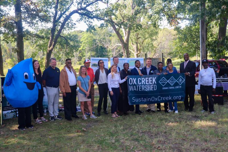 Project partners, Benton Harbor city officials, and residents celebrate the Ox Creek restoration efforts (Photo: Zaire Williams/Benton Spirit News)