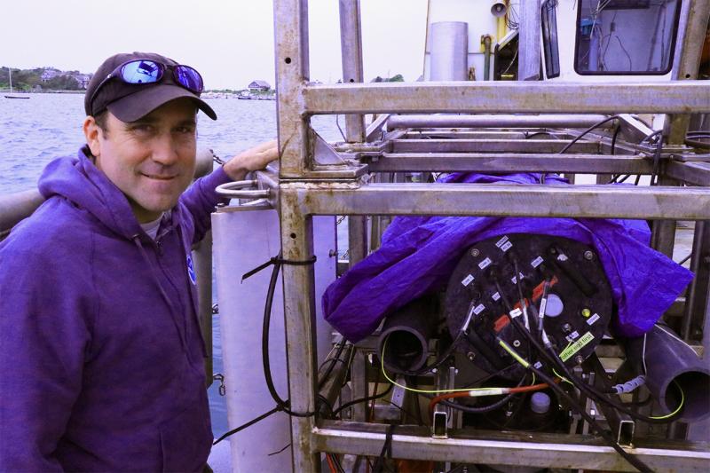 Pete Chase standing next to the HabCam deployment setup.