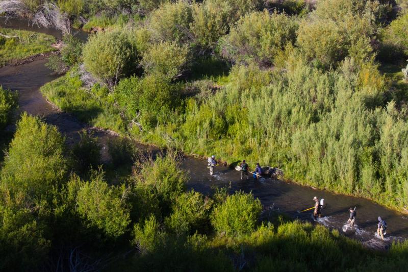 Aerial view of people sampling in Camas Creek, Idaho
